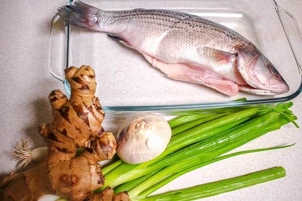 Steamed Whole Fish with Ginger, Scallion and Crispy Garlic (Cá Hấp Hành Gừng)