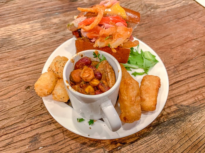 Halfsmoke half-smoke, mac and cheese bites, veggie chili and tater tots