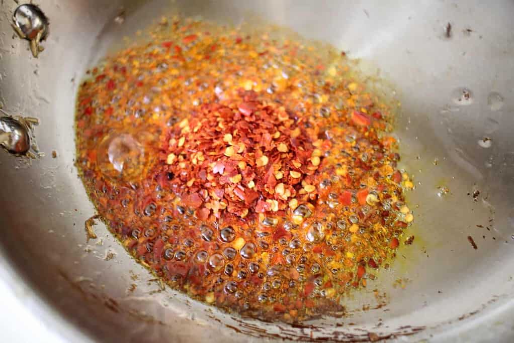 Chili flakes in oil for Spicy Vietnamese Beef Noodle Soup (Bún bò Huế)