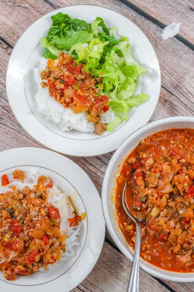 Vietnamese Ground Pork in Tomato Sauce (Thịt Băm Sốt Cà Chua) served with rice and lettuce, noodles